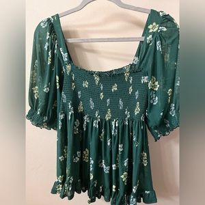 Free People green floral flounce top.